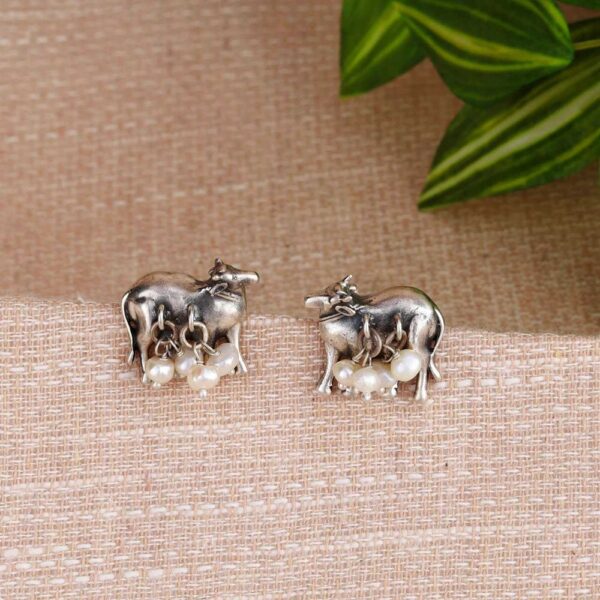 Silver cow studs