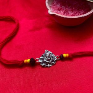 handmade ganesha silver rakhi online