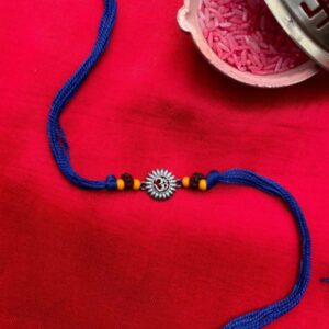 Buy handmade Om silver rakhi online