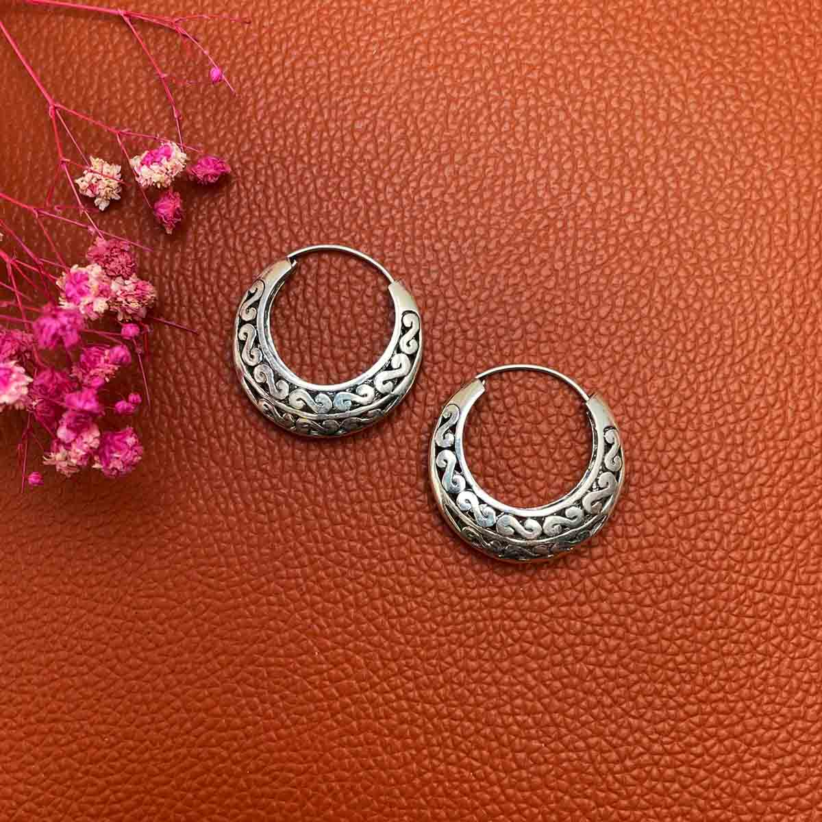 Swirl hoops in silver