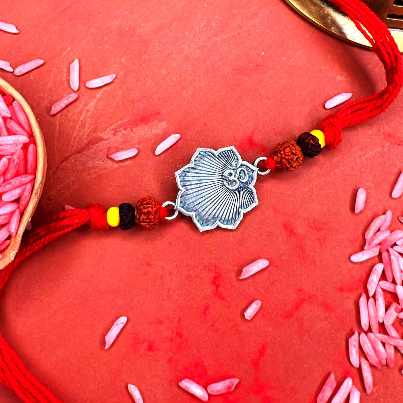 Om Silver rakhi