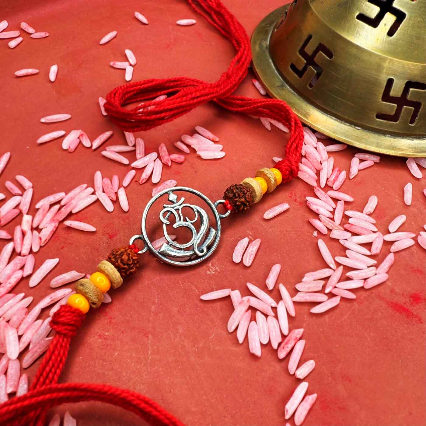 Om Silver Rakhi