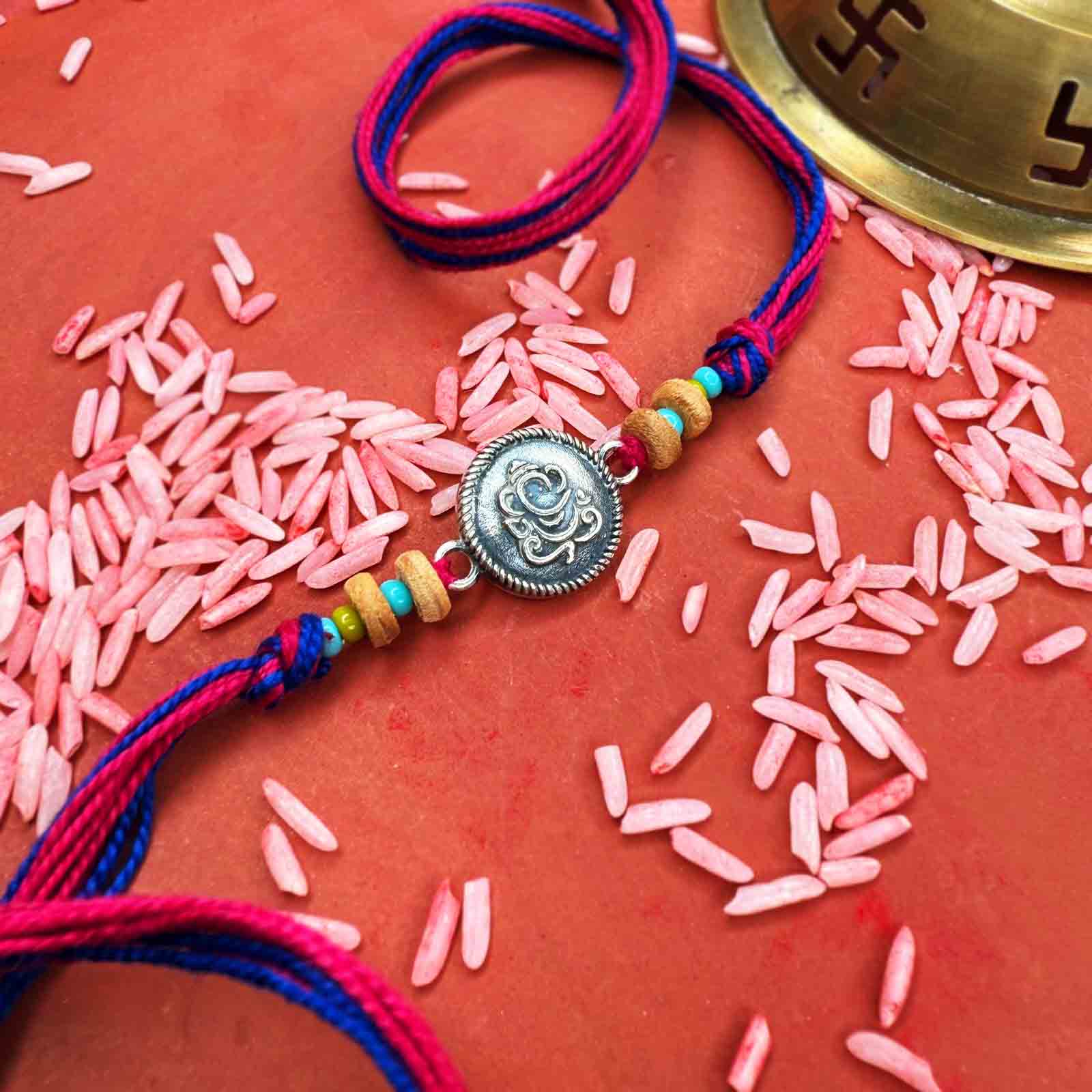 Gannu silver rakhi